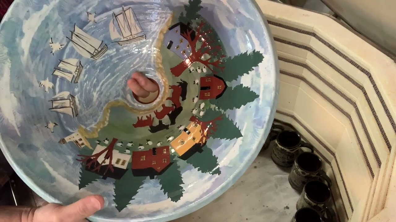 Cone 04 glaze kiln unloading.