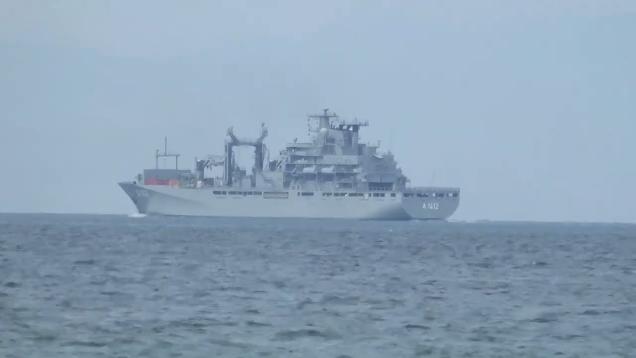 Germany's warship, Frankfurt am Main A1412, among merchant ships leaves Thessaloniki