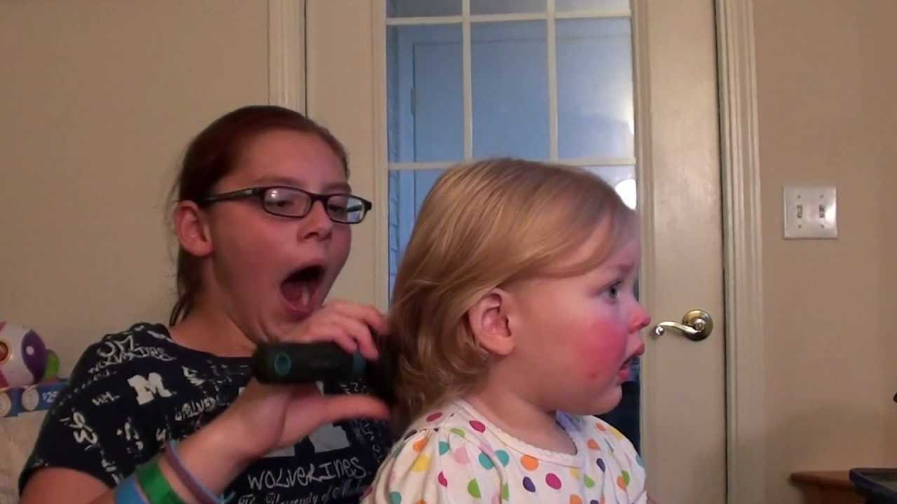 Connor brushing Toop's hair and watching Tooter's 