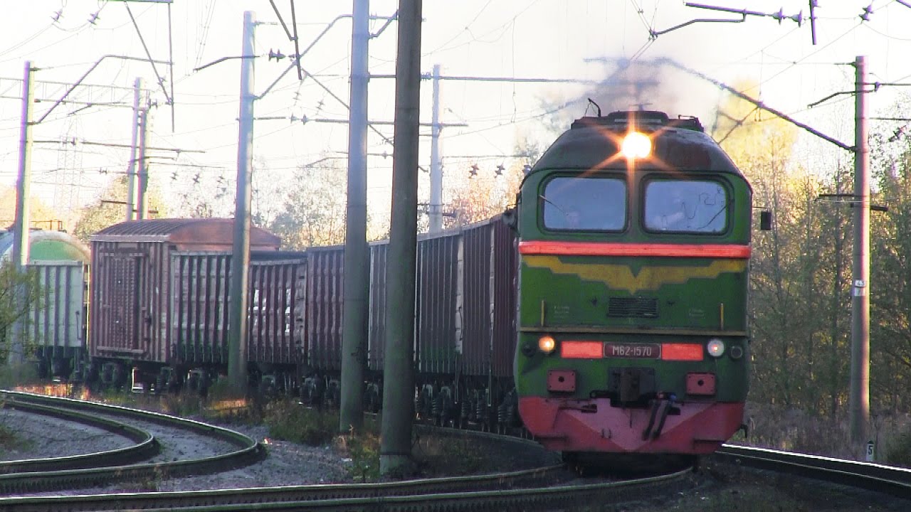 Тепловоз М62-1057 с грузовым поездом
