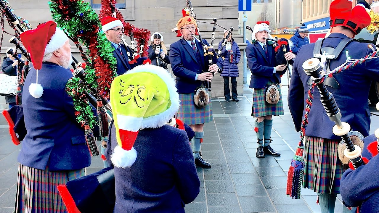 A festive Perth & District Pipe band playing Island Air during Perth’s 2025 Christmas celebrations
