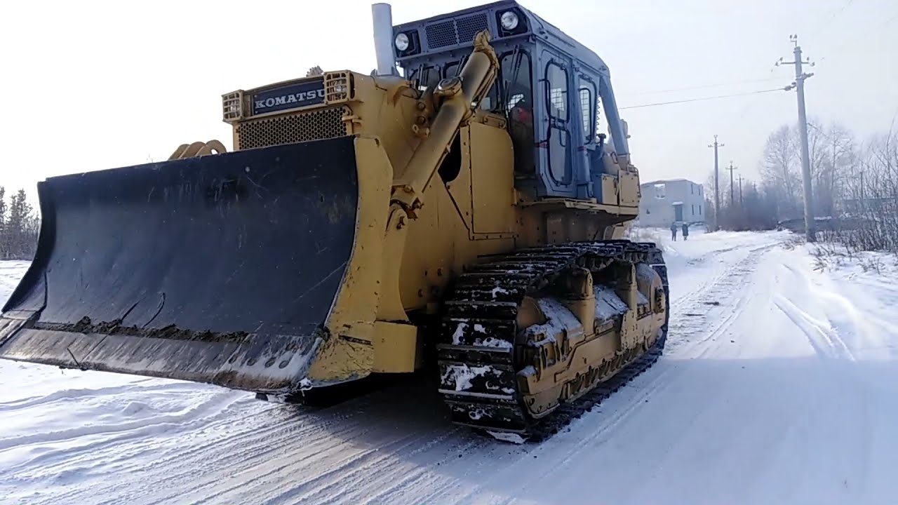 Как поменять опорные катки на KOMATSU D355A