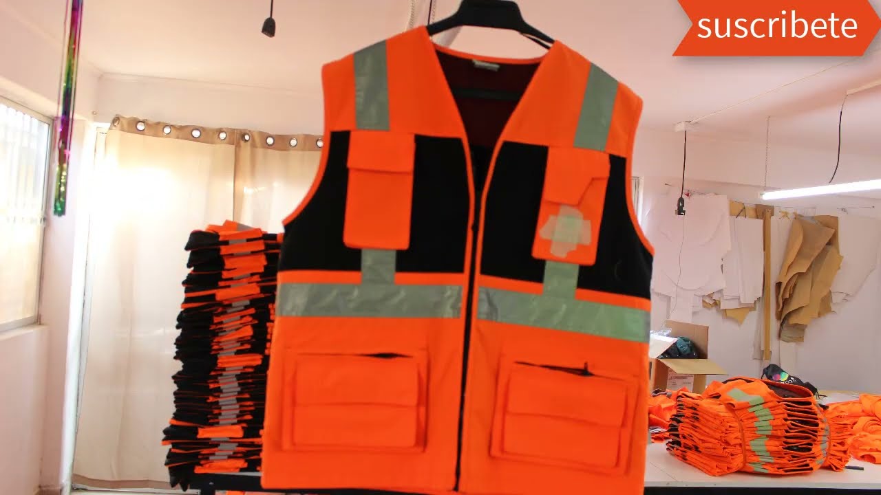 COLOCADO DE CIERRE A CHALECO GEOLOGO ROPA CORPORATIVA