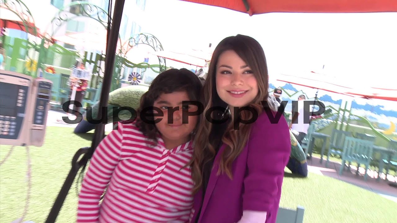 Miranda Cosgrove and fans at Miranda Cosgrove Visits Rady...