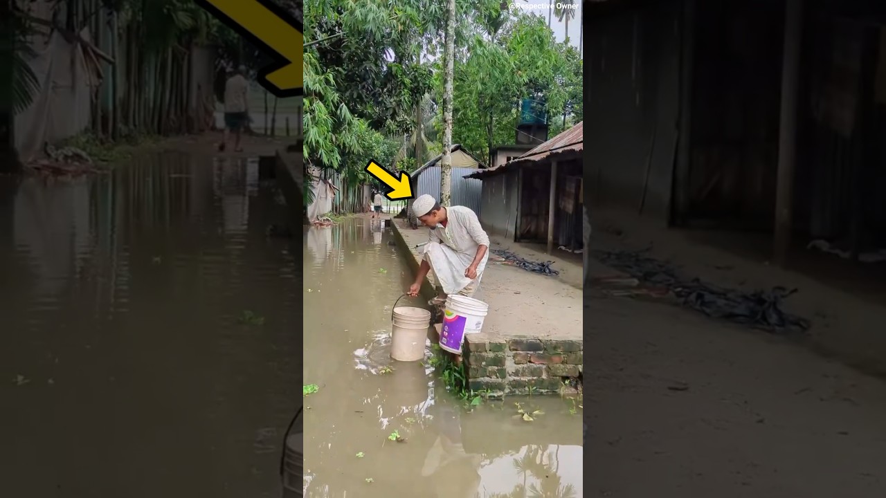 Man Uses Buckets to Cross Flooded Road 😂🌊 #shorts