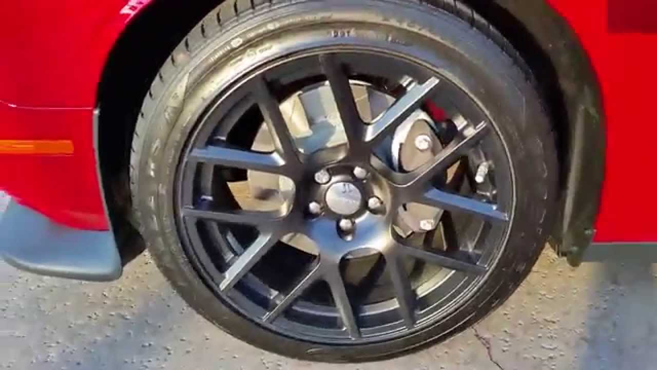 Two 2015 Dodge Challenger R/T Scat Packs in Redline Tri-Coat and Bright White