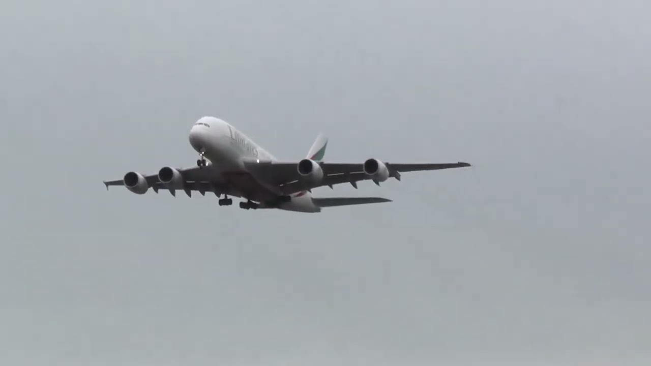 Ryanair joins and leaves runway followed by the first of two go arounds for the Emirates A380 at BHX