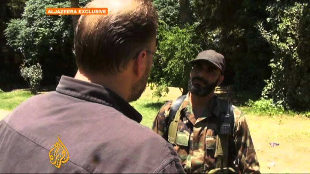 Captured Syrian soldier defects to opposition