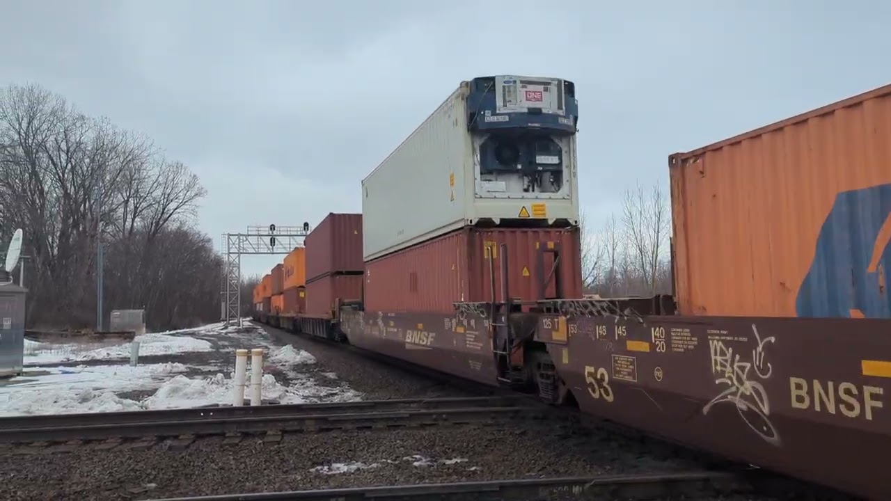 NS intermodal freight train with a fouled horn