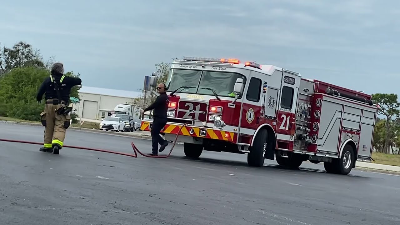 Sarasota county engine 21 arriving on scene of dumpster fire.