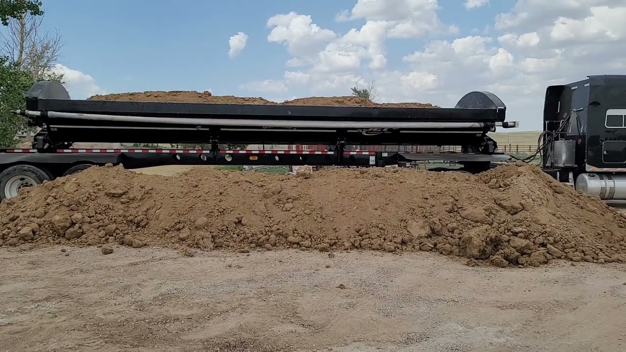 18 Wheeler Side Dump Delivering 18 Cubic Yards of Fill Dirt in Denver CO