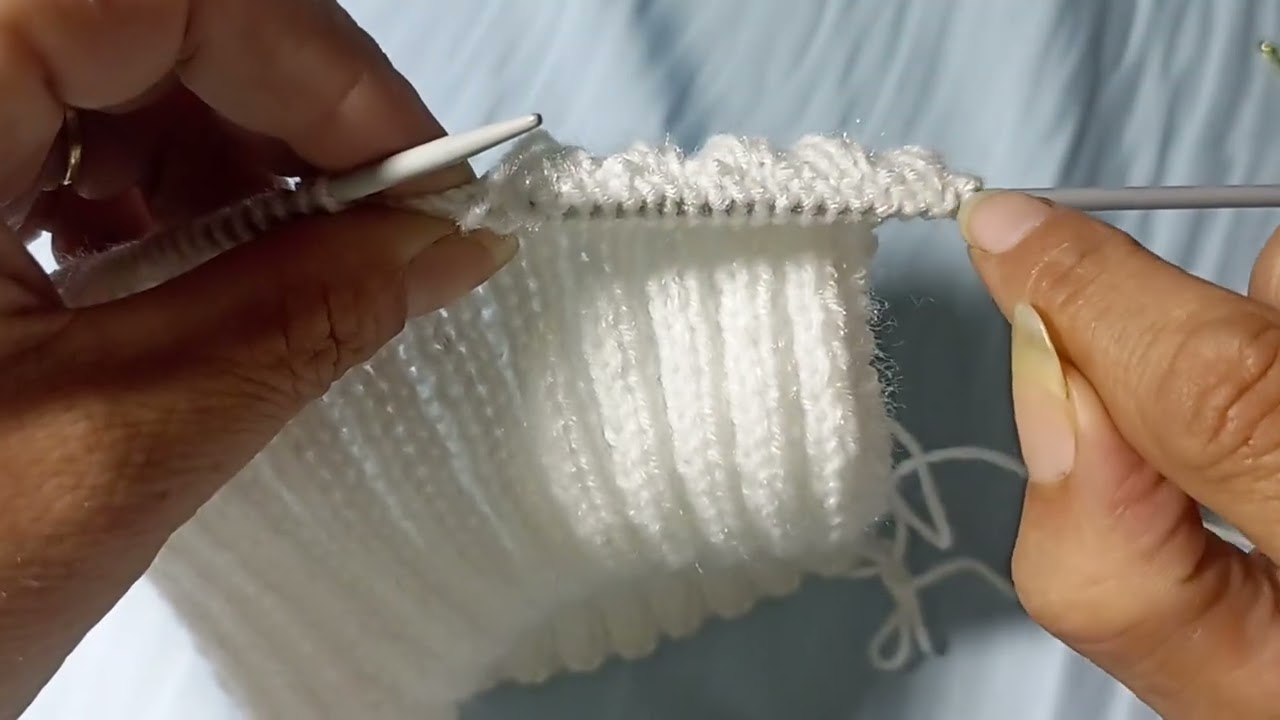 Knitting New born baby's winter vest 