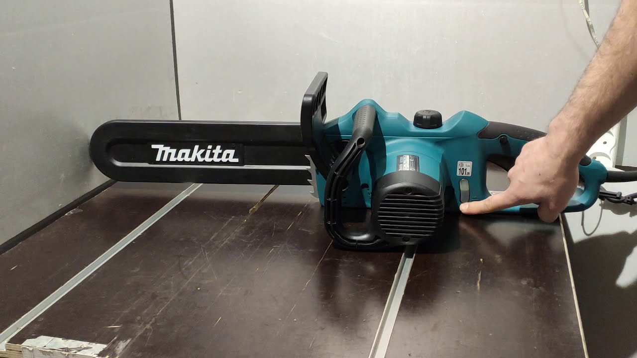 Makita UC3520A электрическая цепная пила.