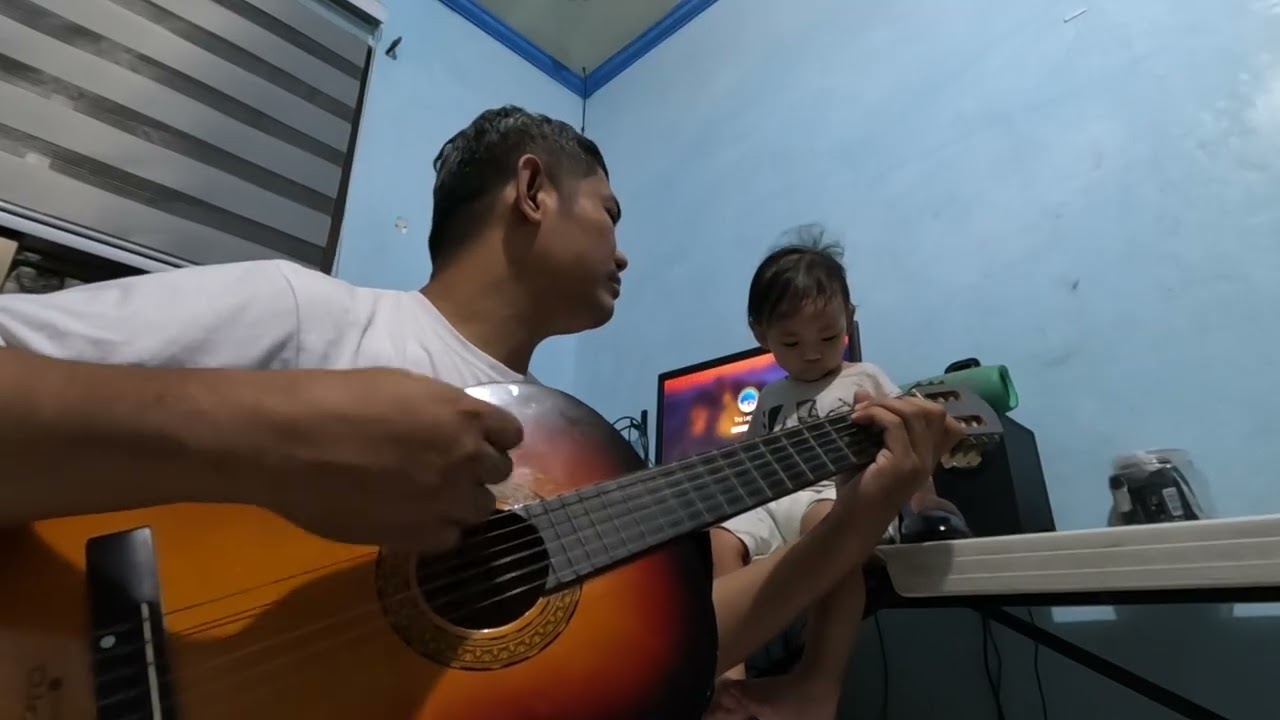 Daddy Plays Guitar for Emori