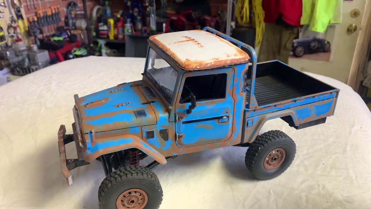 MN Model FJ 45 rusty look with  260 motor upgrade, battery relocation and scale wpl wheels