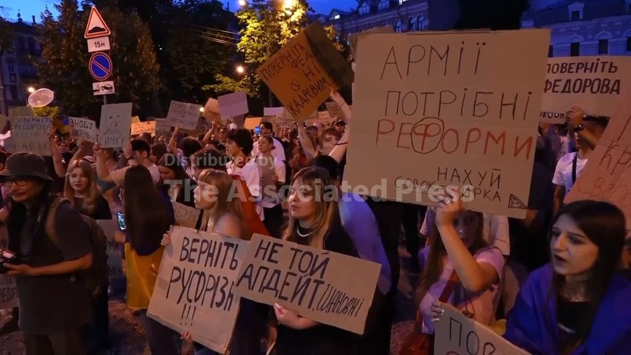 Protesters stay till night and plan to return after Zelenskyy dismisses popular defense minister