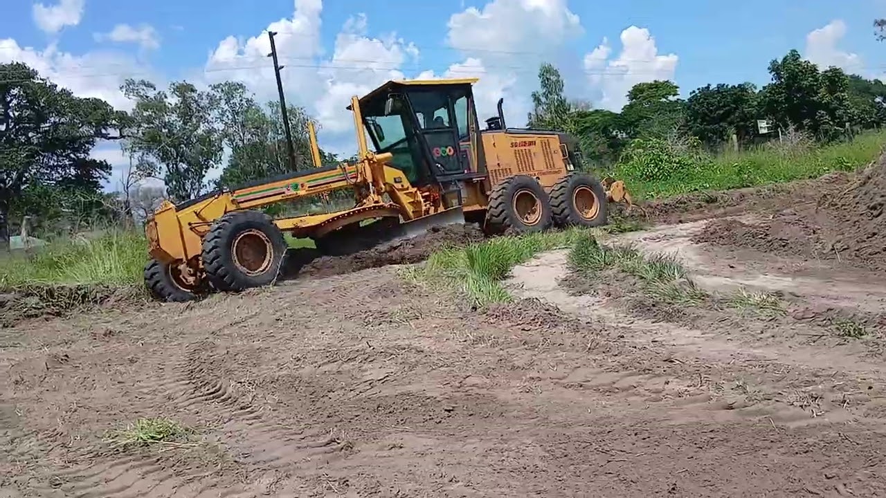 Shantui Grader cutting road side drain