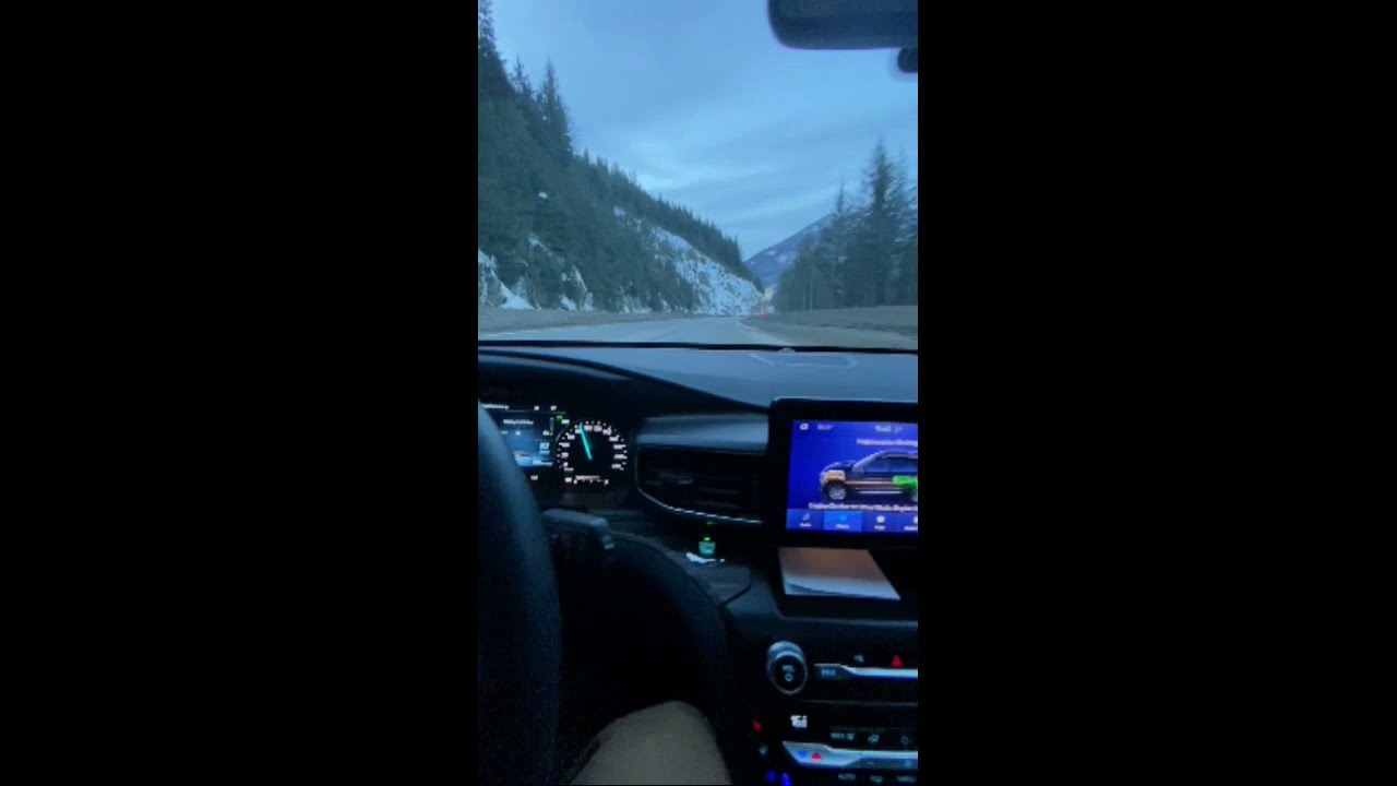 2020 Ford Explorer Hybrid Towing a Travel Trailer