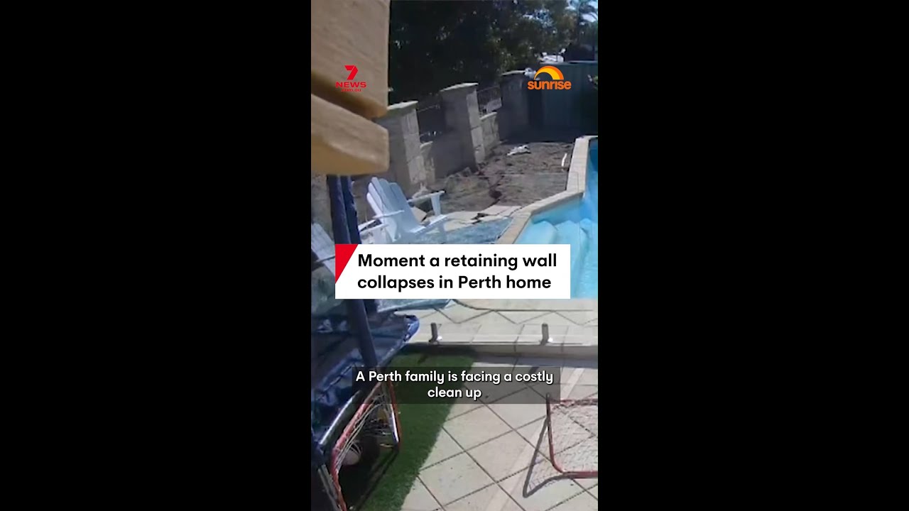 Moment a retaining wall collapses in Perth home