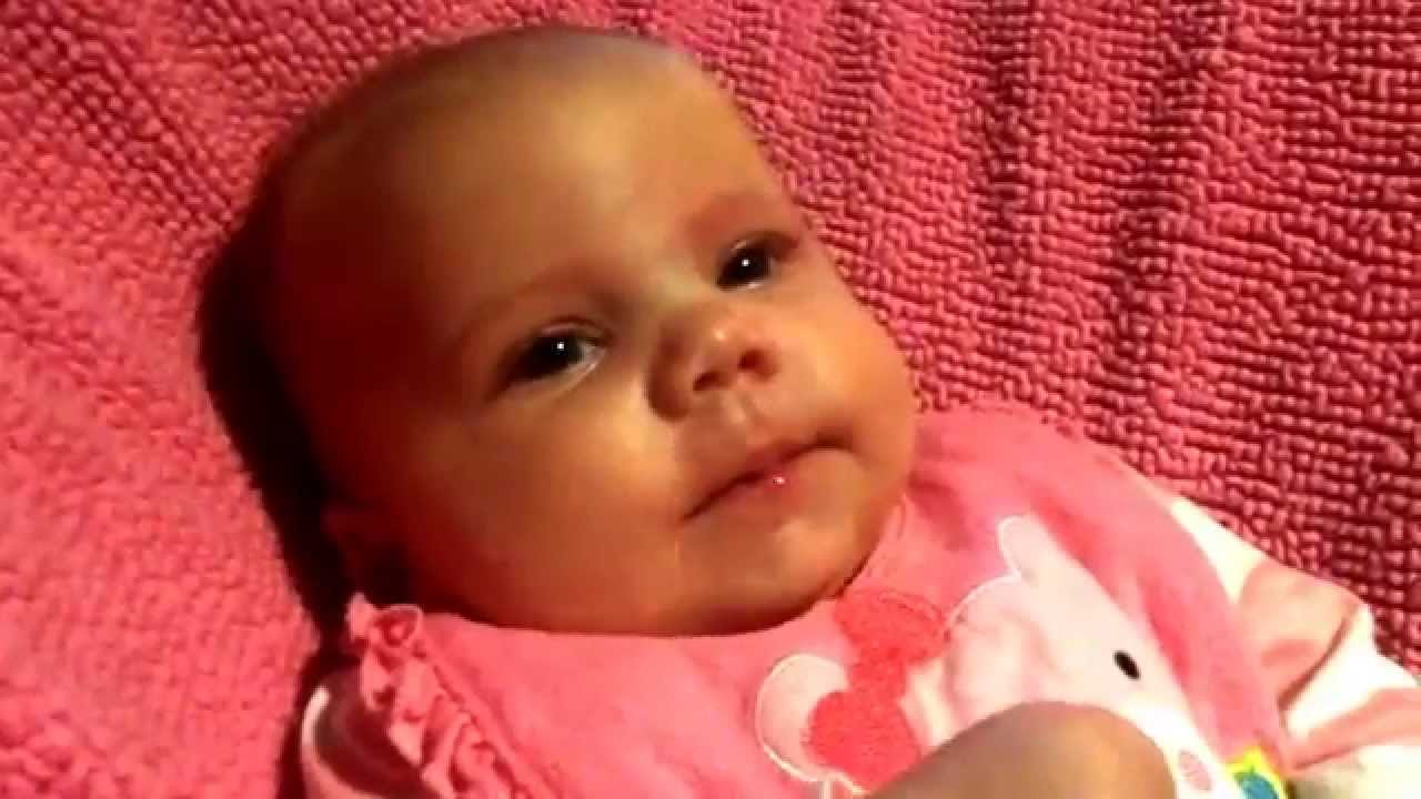 Baby Ellie eats applesauce for the first time!