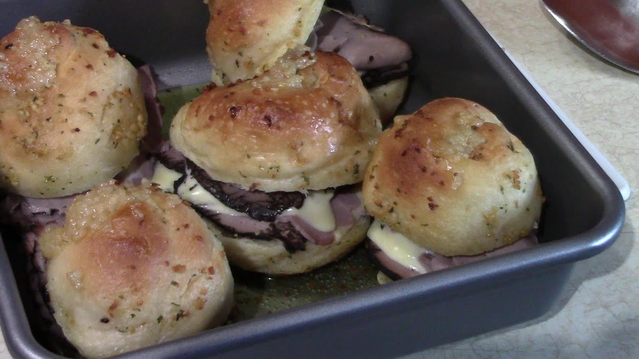 Garlic Knot Sliders with Roast Beef, Cheese and Horseradish Sauce