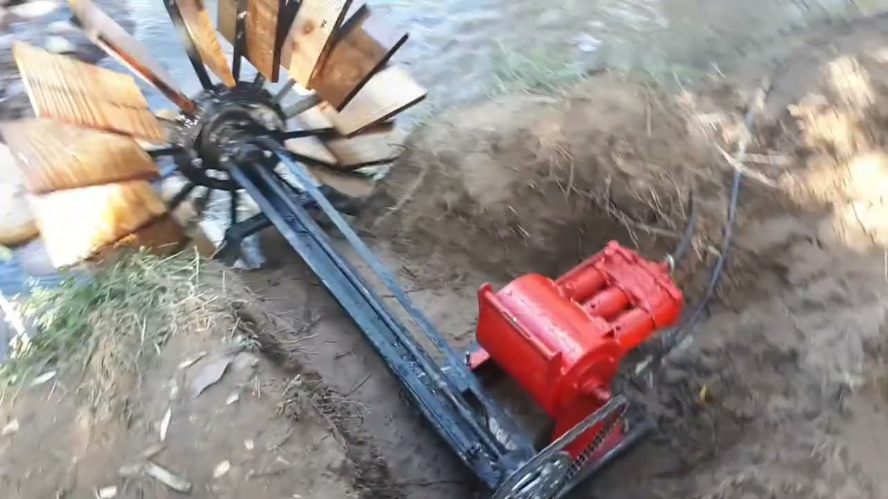 Mostrando a roda d'água no rio!!