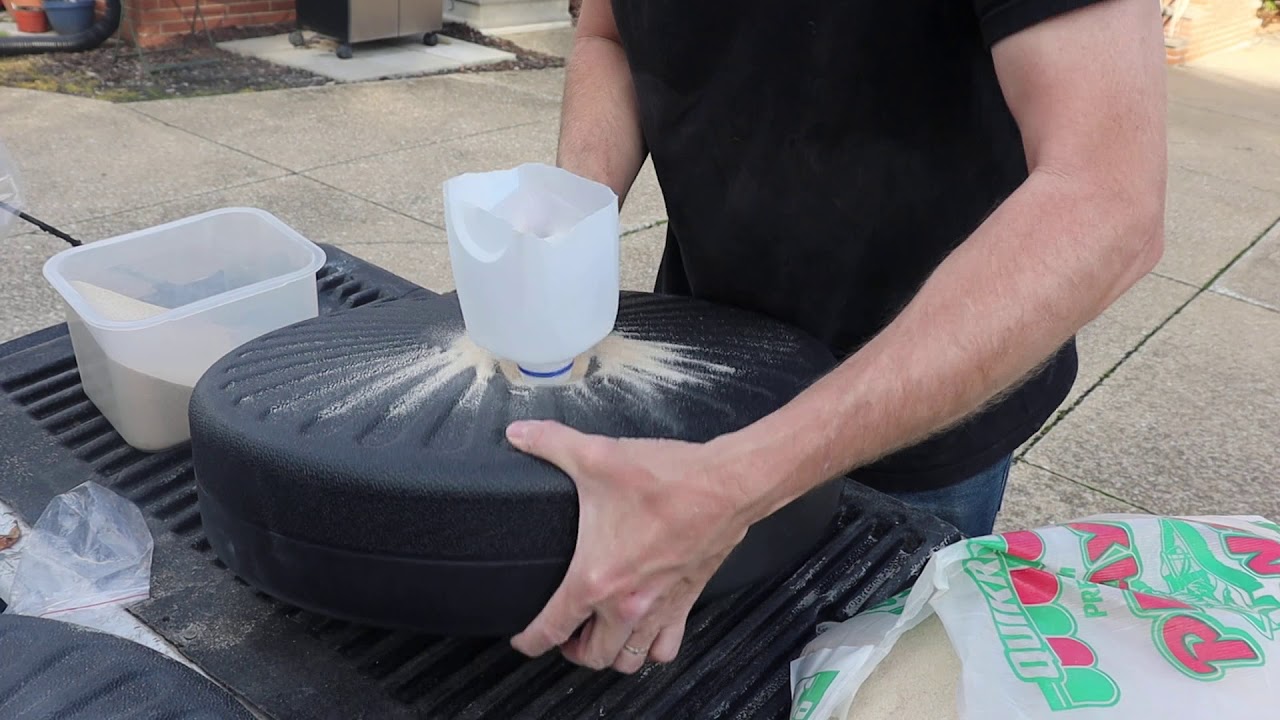 How to fill an umbrella base with sand