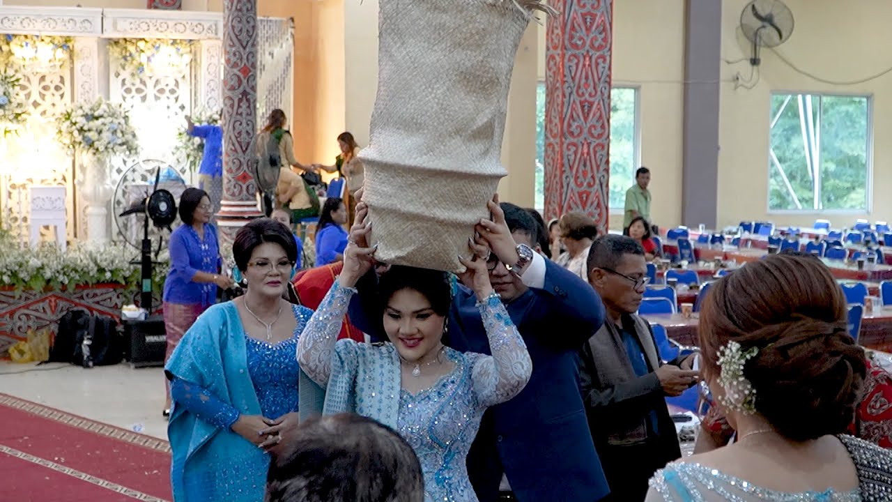 Partumpolon Binsar Daniel Panjaitan & dr. Lisdawaty Siregar