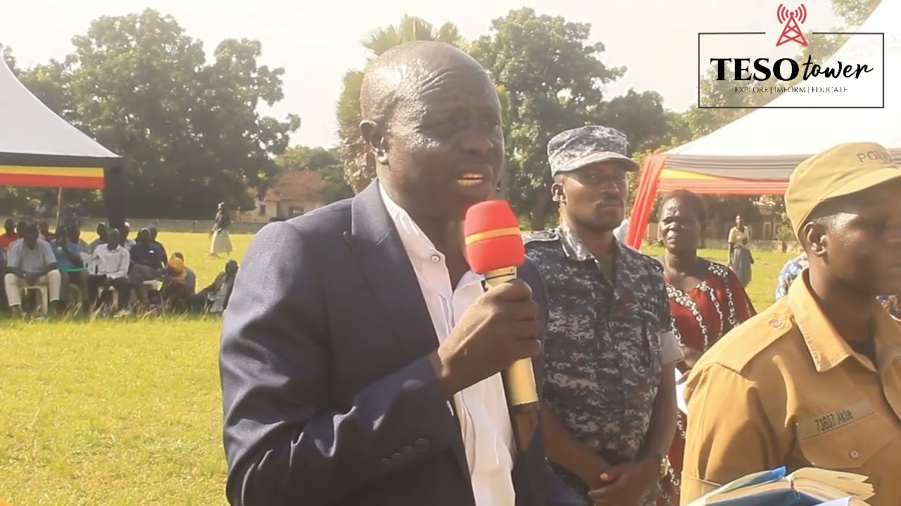 Top secret revealed: Mayor Paul Omer squeezes the N.R.M's untouchable Teddy Acham and Charles Elasu.