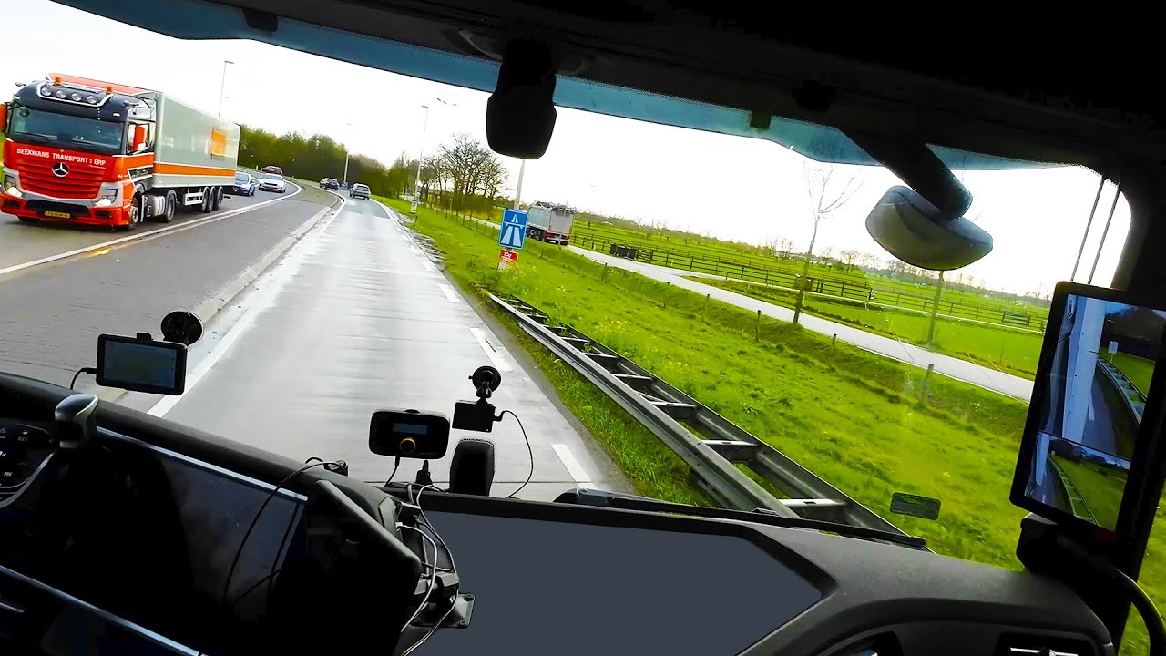 POV Truck Driving DAF XF in Netherlands - Lonely truck driver on highway on sunny day