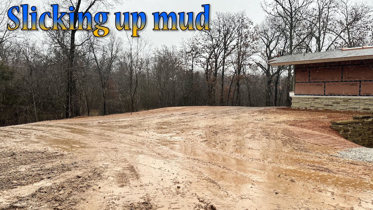 Finishing The Rough Grade On The Stone House In The Rain