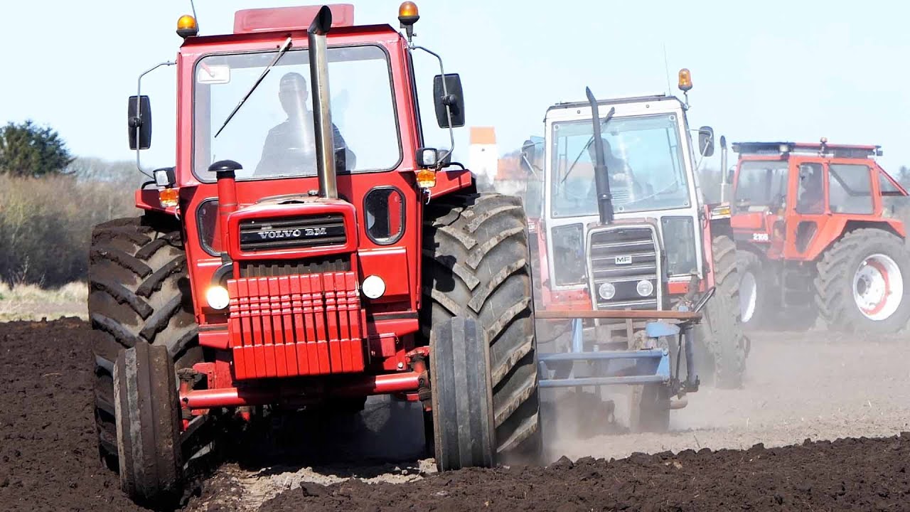 VINTAGE TRACTORS PLOWING