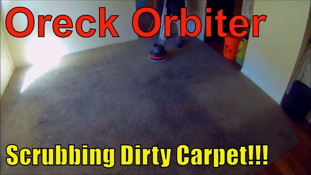 Oreck Orbiter Being Used To Clean Ruined Carpet