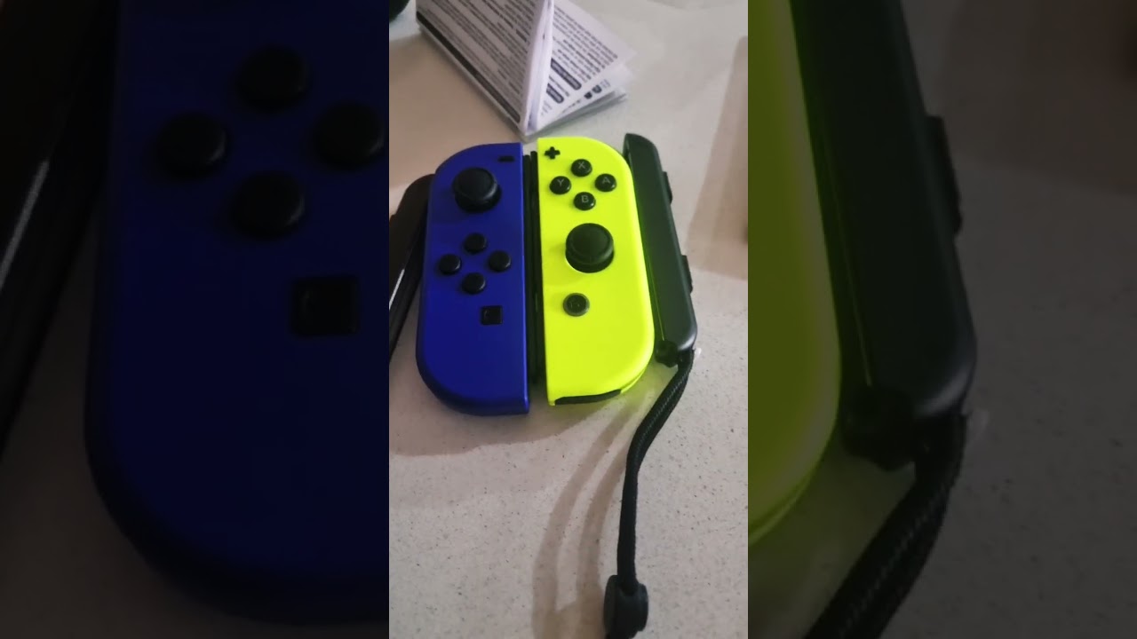 unboxing the blue and neon yellow joy-cons