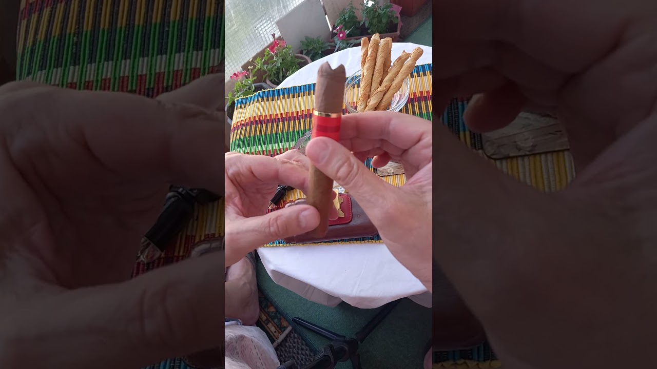 Smoking a Macanudo Inspirado Orange Cigar