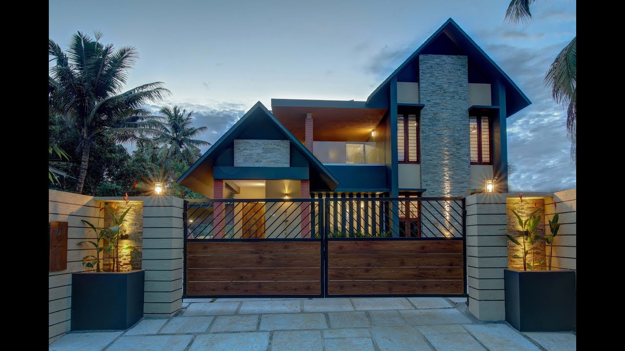 Tropical Style modern Kerala home in 15 cents