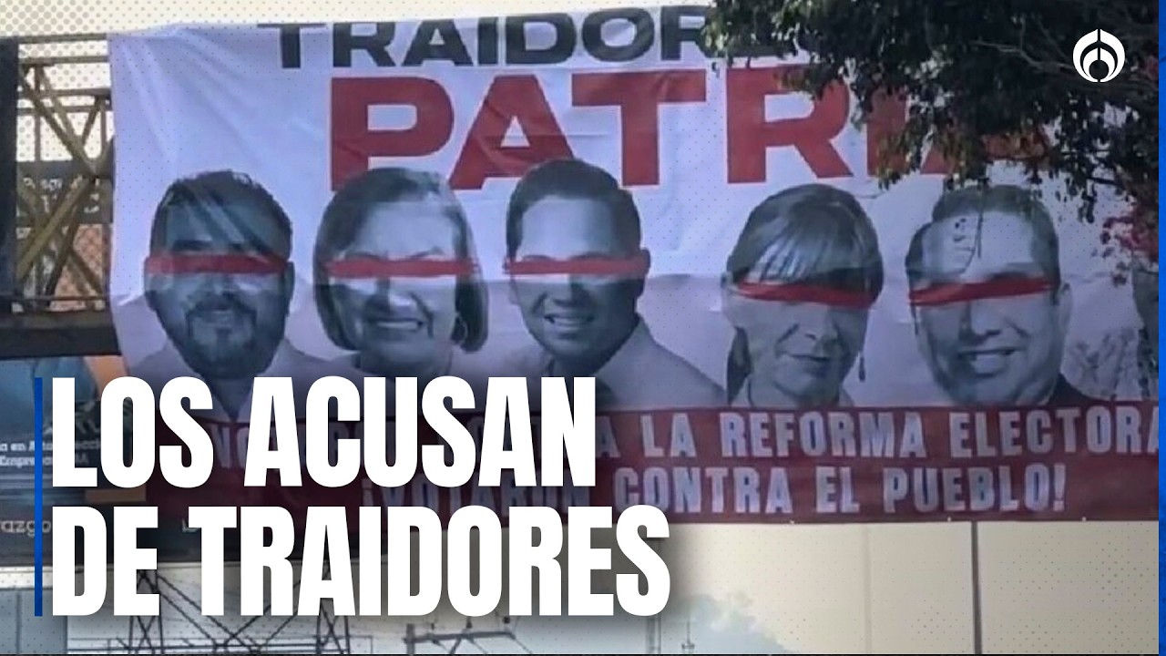 Diputados del PT aparecen en mantas por haber votado en contra de la reforma electoral