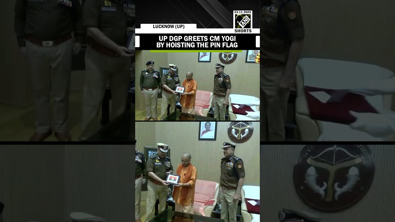 UP DGP Rajeev Krishna greets CM Yogi Adityanath by hoisting the pin flag on Flag Day
