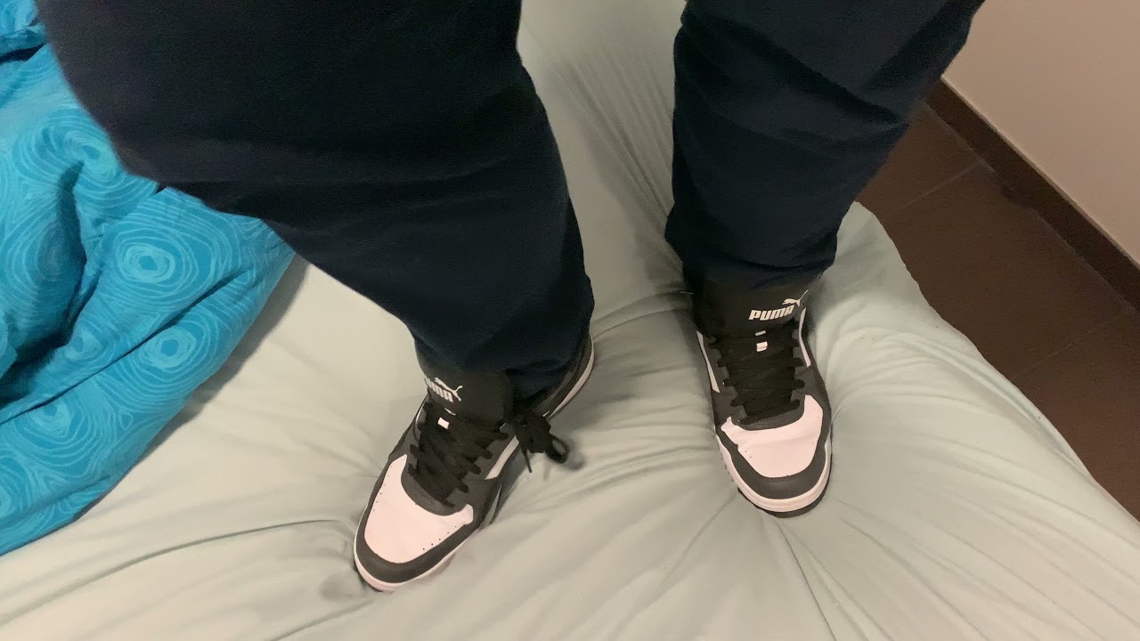 Puma Mid Tops on my bed