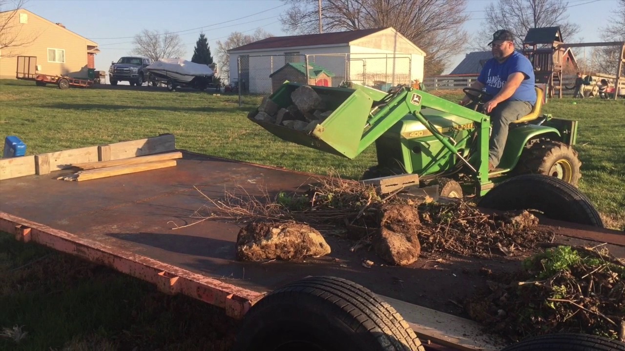 John Deere 400 With Loader: Loading Rock