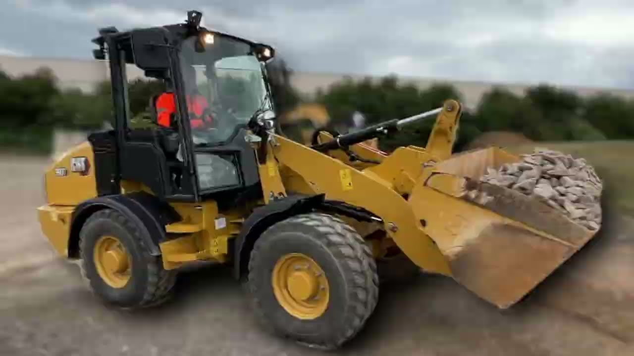 New Cat Compact Wheel Loader range with 14yr old Lucas and Caterpillar expert Elie Abi-Karam
