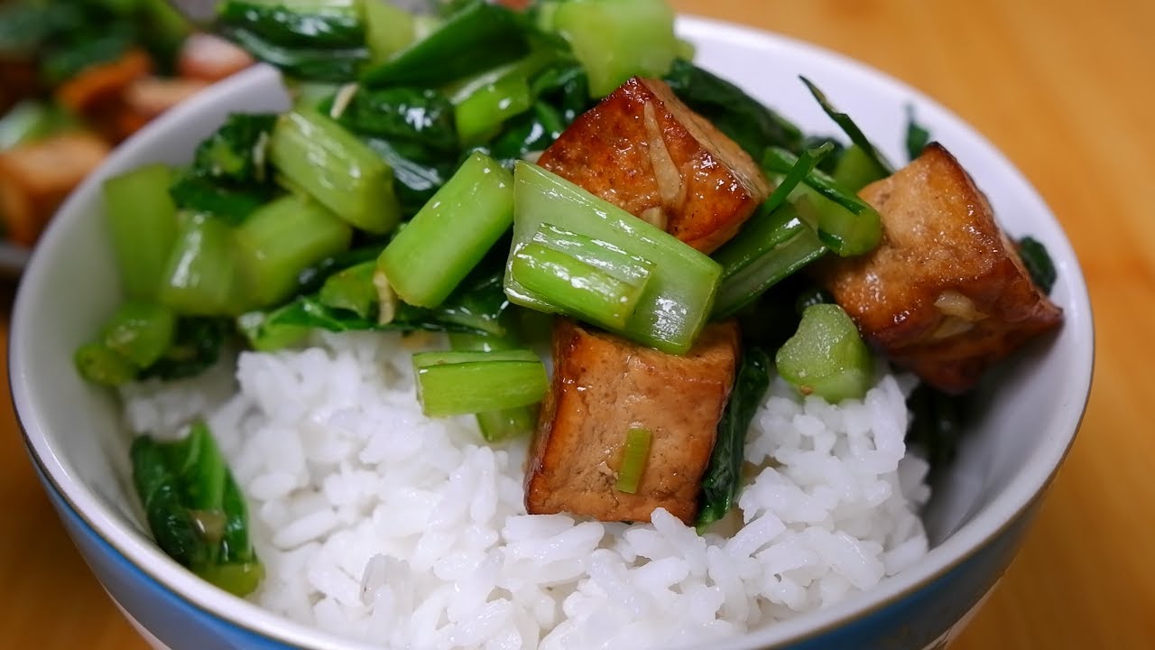 Serve the stir fried marinated tofu over steamed rice, it's absolutely delicious!