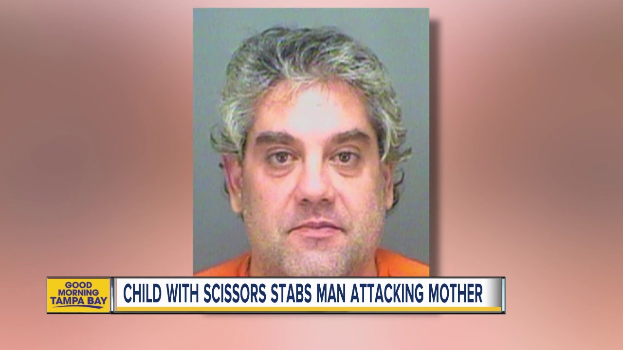 Deputies: Child stabs man with scissors to stop attack on mom