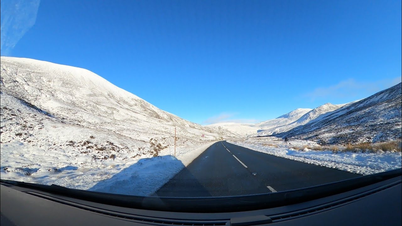 Driving through Cairngorms National Park in Winter