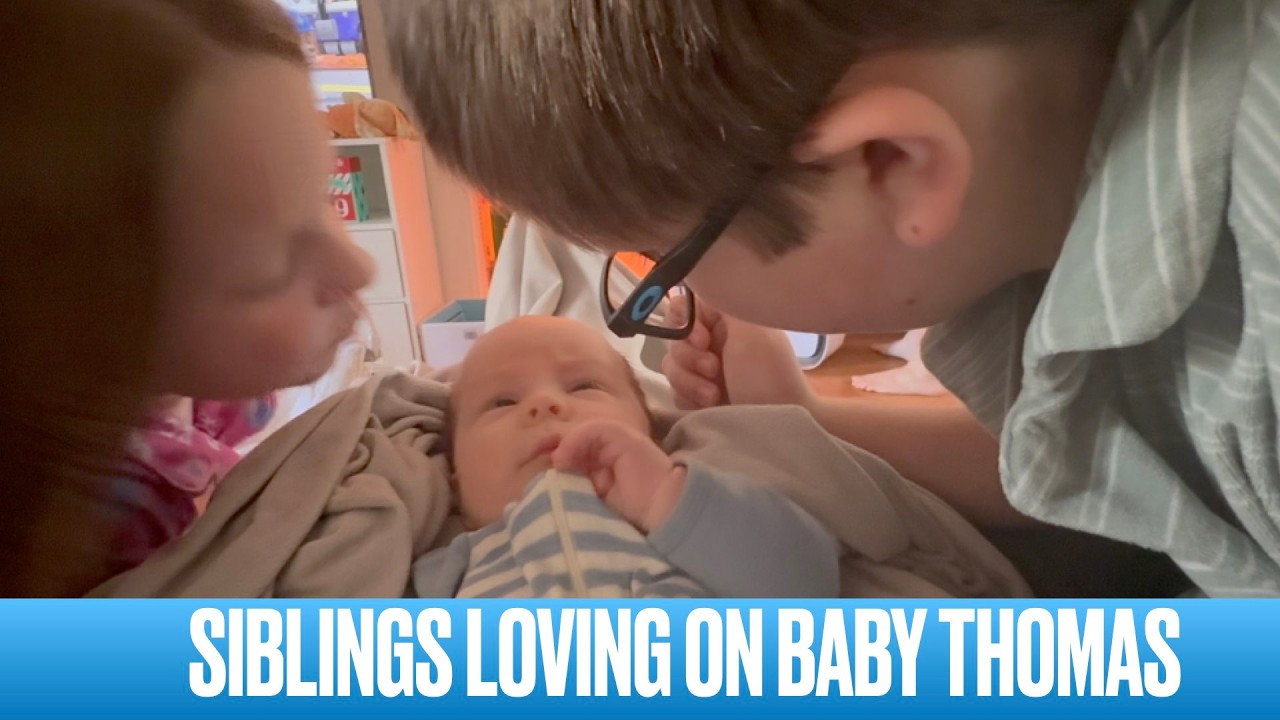 SIBLINGS LOVING ON BABY THOMAS