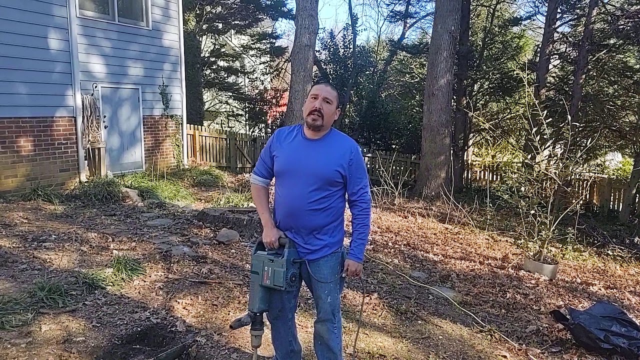 Removing roots with a hammer drill