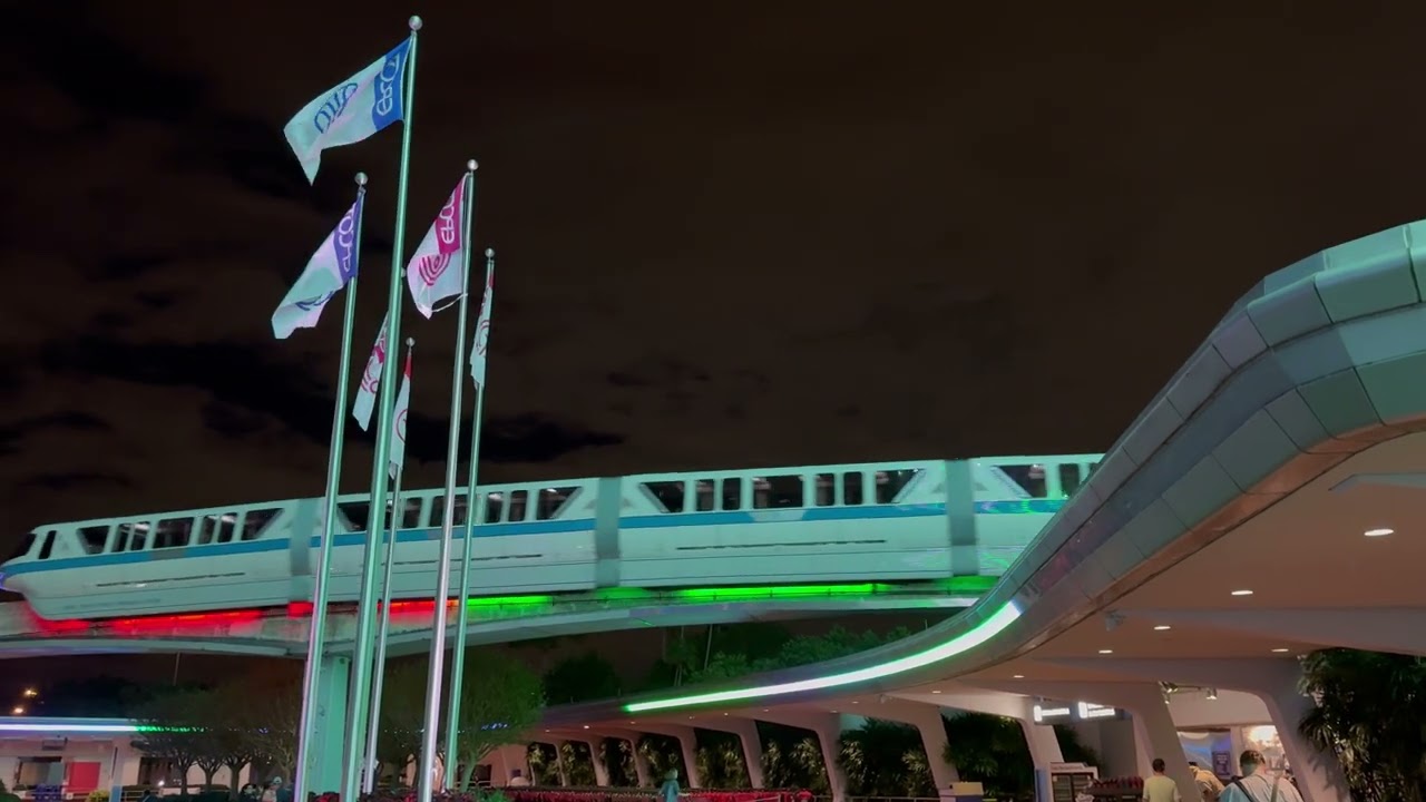 Monorail Passing Epcot Flags - Christmas LEDs - Epcot, Walt Disney World 12-17-2024
