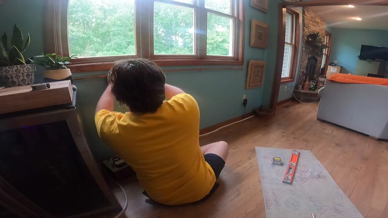 How I hang artwork. A guide to inexpensive, simple, copper picture rail.