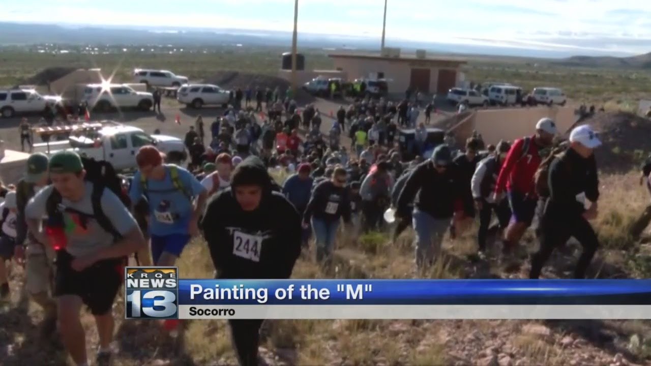 New Mexico Tech students climb Socorro Peak to 'Paint The M'