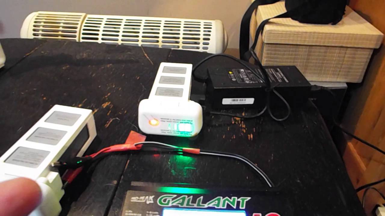 DJI Phantom 2 vision plus v3 charging batteries with a field charger